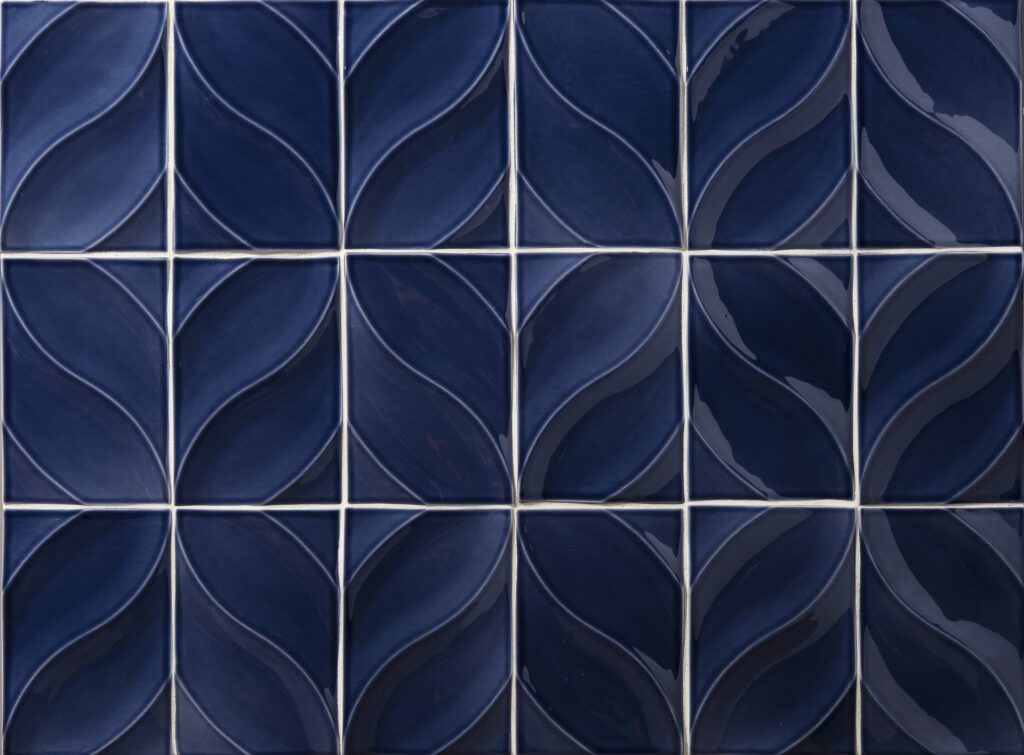 Blue floral-pattern tile with traditional design influences.