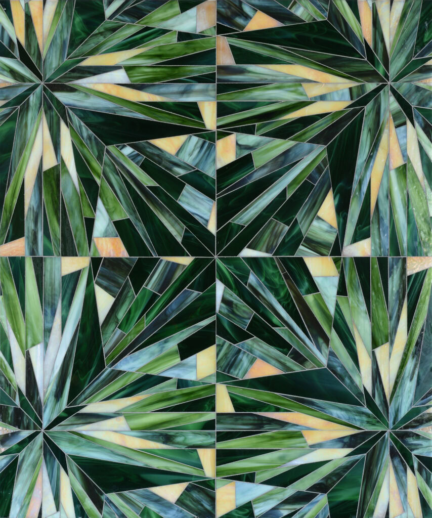 geometric starbust glass tile in green and gold